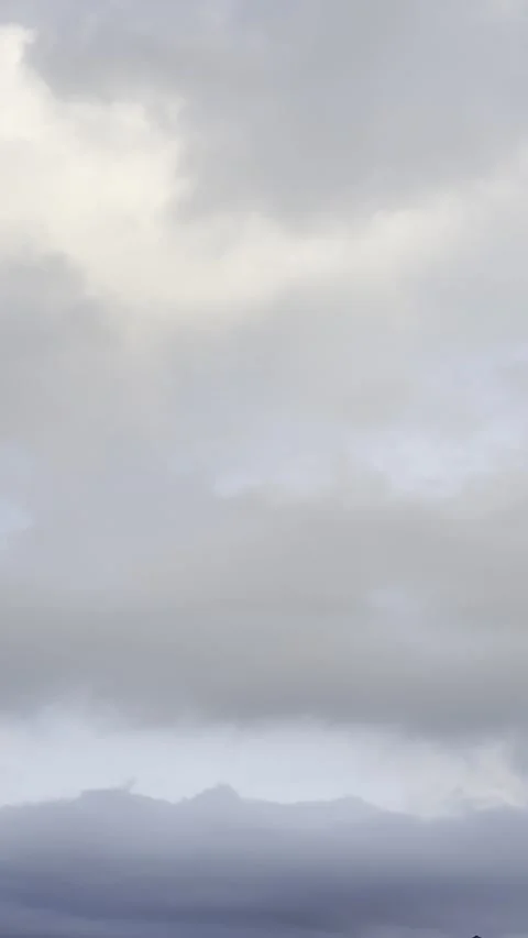 Bright Break in Dark Storm Clouds Video stock 344807487