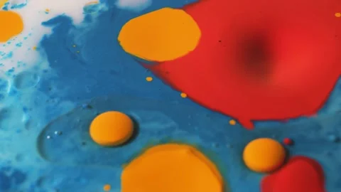 Bright bubbles of ink mixed with a liquid substance of oil, milk, soap. Stock Footage 170303961