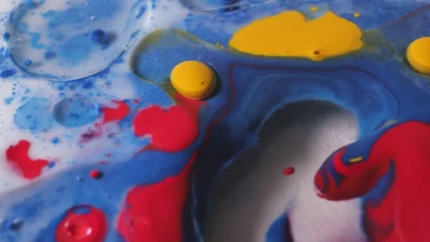 Bright bubbles mixed with butter and milk form a colorful abstraction Stock Footage 171374291