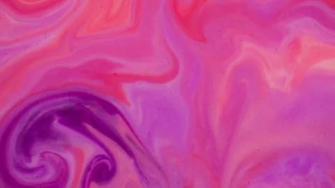 Bright bursts of color created by the interaction of multi-colored paints. Stock Footage 281755822