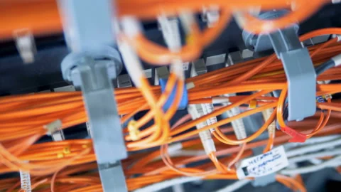 Bright cables connecting data servers into a network 스톡 동영상 99678349