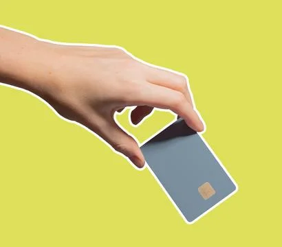 Bright card payment concept. Hand holding colorful plastic bankcard with ch.. Stock Photos