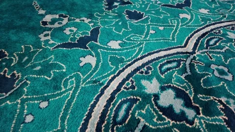 Bright carpet design with intricate patterns on display Stock Footage 336160166