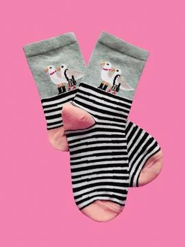Bright children's multi-colored socks with decorative pattern, top view Stock Photos