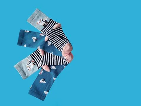 Bright children's multi-colored socks with decorative pattern, top view Stock Photos