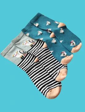 Bright children's multi-colored socks with decorative pattern, top view Stock Photos