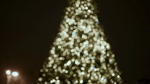 Bright Christmas tree full of lights and big blue balls Video stock 261395195