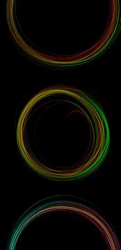 Bright circles of light appear in a dark space, revealing intricate designs a Stock Photos
