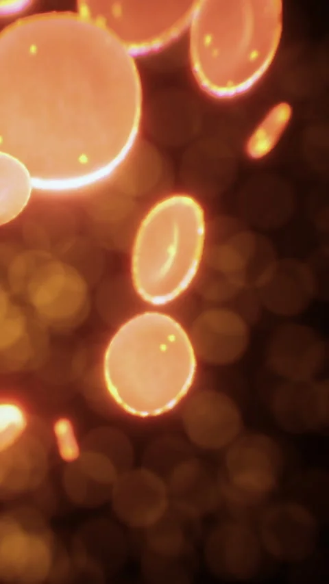 Bright circles of light flow against a dark background creating a lively scene Stock Footage 336174517