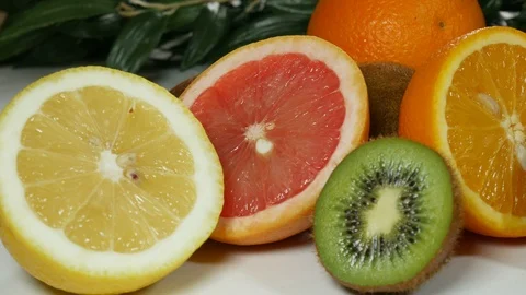 Bright Citrus and Kiwi on the table Stock Footage 87417005