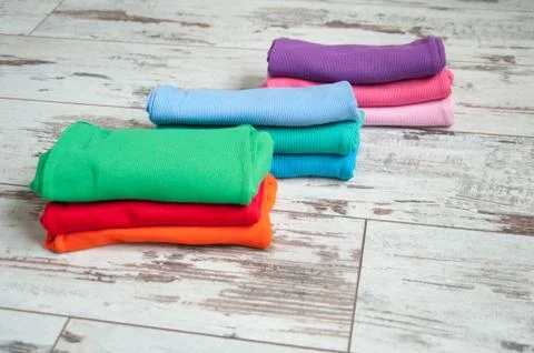 Bright clothes stacked Stock Photos