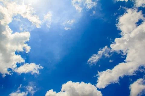 Bright clouds with blue sky Stock Photos