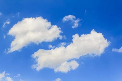 Bright clouds with blue sky Stock Photos