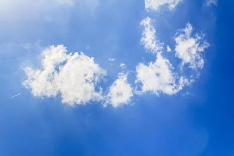Bright clouds with blue sky Stock Photos