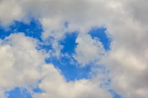 Bright clouds with blue sky Stock Photos
