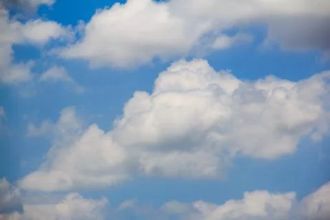 Bright clouds with blue sky Stock Photos