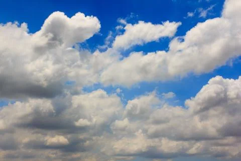 Bright clouds with blue sky Stock Photos