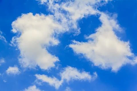 Bright clouds with blue sky Stock Photos