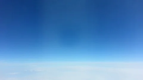 Bright clouds in a dark blue sky Stock Footage 113304505