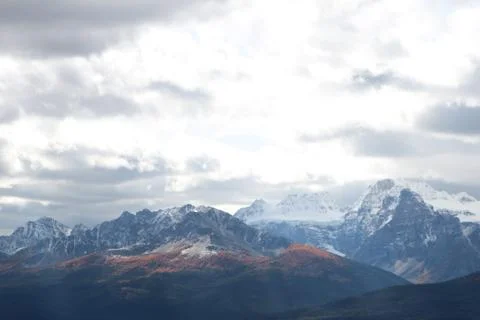 Bright clouds over mountain Stock Photos