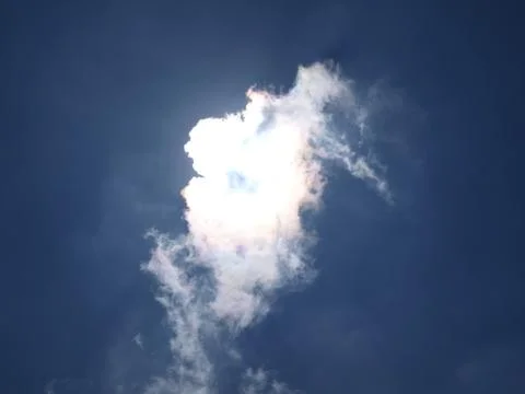The bright clouds with sun Stock Photos