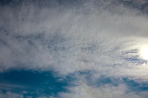 Bright Clouds with Sunlight Shining Through, Teal Blue Sky Stock-Fotos