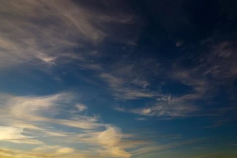 Bright clouds in the twilight sky. Foto stock