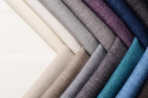 Bright collection of gunny textile samples. Fabric texture background. Stock Photos