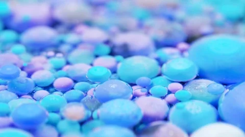 Bright collors bubbles moves in slow motion in oil with acrylic Stock Footage 121752211