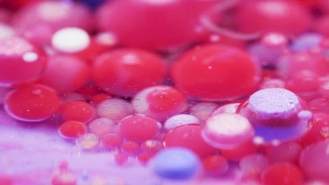 Bright collors bubbles moves in slow motion in oil with acrylic Stock Footage 121752436