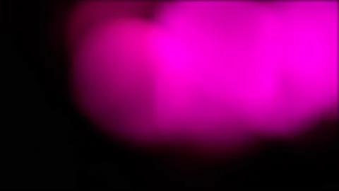 Bright color flashes on a dark background. Light transmits bokeh of sparkling Video stock 150941789