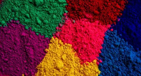 Bright colored background of various powder paints. Stock Photos