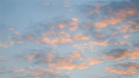 Bright colored clouds float across the sky. Sunset sunlight beautifully Stock Footage 145732496