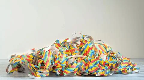 Bright colored confetti on a white background Stock Photos