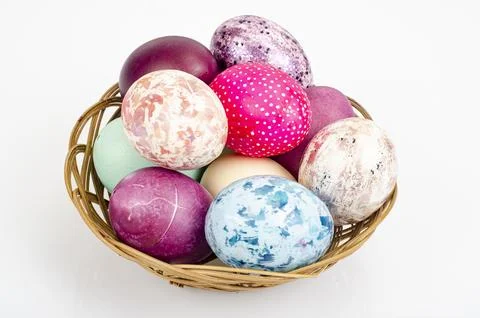 Bright colored Easter eggs on platter, holiday background. Studio Photo Stock Photos