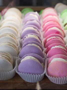 Bright colored macaroons with different flavors, lots of macaroons Fotos de archivo