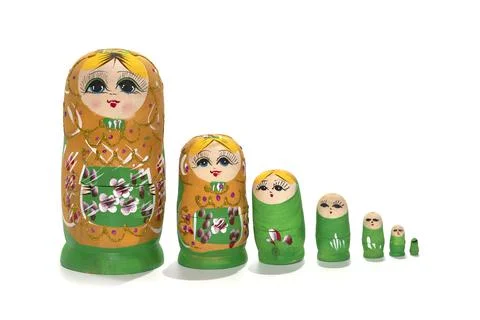 Bright colored nesting dolls on a white background. Russian national souvenir 스톡 사진