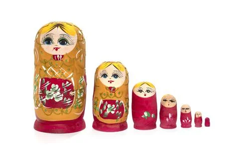 Bright colored nesting dolls on a white background. Russian national souvenir Foto stock