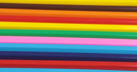 Bright colored pencils rotate around themselves Stock Footage 107557995