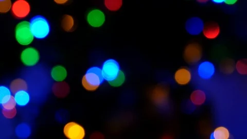 bright colored round lights on black bac... | Stock Video | Pond5
