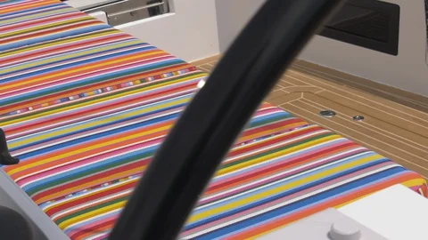 Bright colored sofa on a sailing boat. Stock Footage 127884764