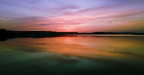 Bright colored sunset over the river Stock Footage 74252789