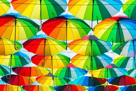 Bright colored umbrellas as a background Stock Photos