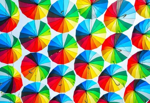 Bright colored umbrellas as a background Stock Photos