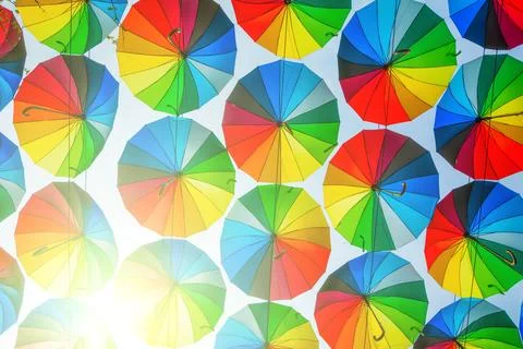 Bright colored umbrellas as a background Stock Photos