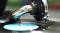 Bright colored vintage turntable, gramophone in city, daytime HD Footage