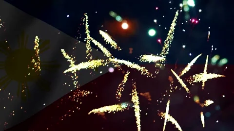 Bright colorful fireworks display exploding over the flag of the philippine.. 库存影片 343690201