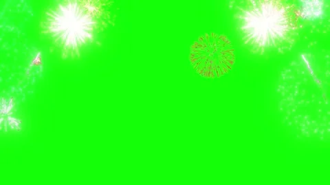Bright Colorful Fireworks Exploding Against A Solid Green Screen Background For Video stock 338316514