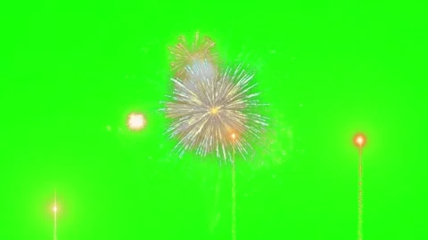 Bright Colorful Fireworks Exploding Against A Solid Green Screen Background For Video stock 338316569