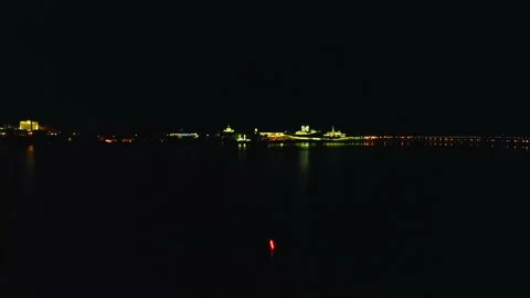 Bright colorful fireworks exploding in the air on a background of the river and Stock Footage 133674951